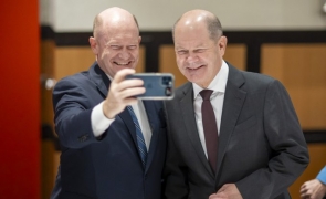 olaf scholz, chris coons